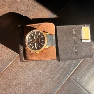 Michael Kors Black and Gold Chronograph Watch